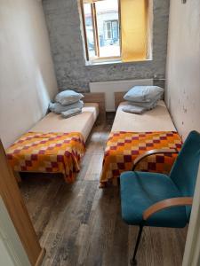Postel nebo postele na pokoji v ubytování Hostel Suda5