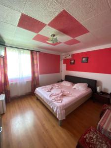 Postel nebo postele na pokoji v ubytování Vila Happy