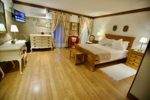Uma cama ou camas num quarto em Quinta de CasalMato