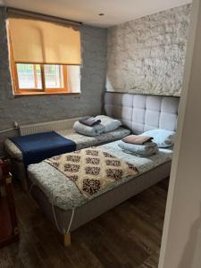 Postel nebo postele na pokoji v ubytování Hostel Suda5