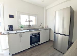 Kuchyň nebo kuchyňský kout v ubytování Castelnuovo Style + 40 fotografií