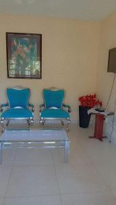 Χώρος καθιστικού στο Casa Aconchegante