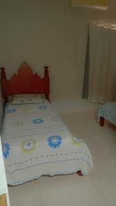 Ένα ή περισσότερα κρεβάτια σε δωμάτιο στο Casa Aconchegante +6 φωτογραφίες