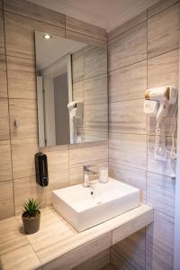 Koupelna v ubytování Filippou Luxury Apartments + 38 fotografií