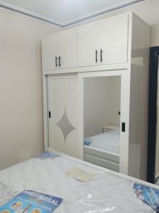 Ένα ή περισσότερα κρεβάτια σε δωμάτιο στο Al HOCEIMA