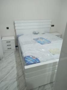 Ένα ή περισσότερα κρεβάτια σε δωμάτιο στο Al HOCEIMA