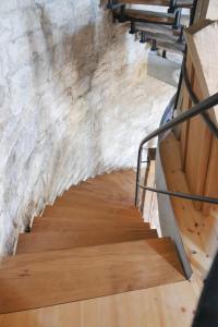 a staircase in a building with snow on the wall at Holländermühle Tultewitz 