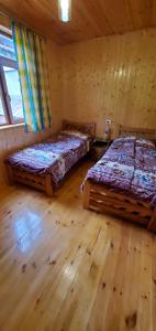 Postel nebo postele na pokoji v ubytování GuestHouse Ellie- Elisabeth