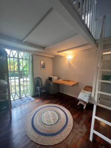 Postel nebo postele na pokoji v ubytování Ti Lakaz Kreol 1