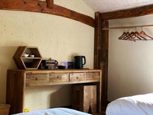 Voodi või voodid majutusasutuse Zhejiang Anji Xiaoshe B&B Near Zhejiang North Grand Canyon Deep Creek Canyon Rafting Jiangjunguan Rafting Wind Paragliding Zhangli Ancient Road Longwangshan Scenic Area toas