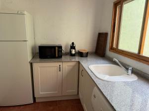 Kuchyň nebo kuchyňský kout v ubytování L'hotelet 16 Rural loft