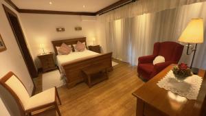 Uma cama ou camas num quarto em Quinta de CasalMato