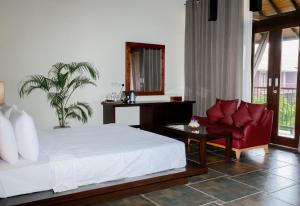 Postel nebo postele na pokoji v ubytování Celestia Ayurveda Resort