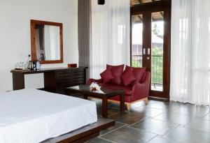 Postel nebo postele na pokoji v ubytování Celestia Ayurveda Resort