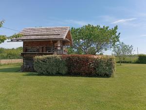 Vonkajšia záhrada v ubytovaní Gîte / chalet meublé pour 2 personnes le 1780