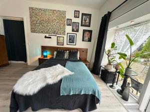 Postel nebo postele na pokoji v ubytování Hobro guesthouse