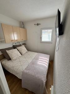 Postel nebo postele na pokoji v ubytování Appartement bord de mer