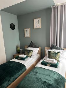 Posteľ alebo postele v izbe v ubytovaní Apartament Karkonoskie Tarasy