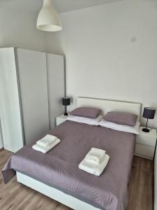 Postel nebo postele na pokoji v ubytování Apartment Misic