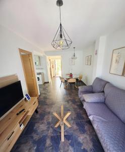 A television and/or entertainment centre at Apartamento calle de la Cordera, 3