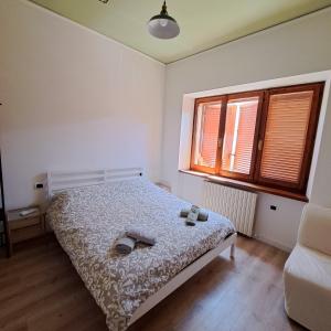 Postel nebo postele na pokoji v ubytování daClaudia,it