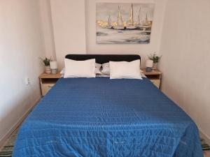 Postel nebo postele na pokoji v ubytování Apartments Tragurion