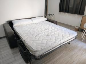 Postel nebo postele na pokoji v ubytování Studio Apartments Salvo 7