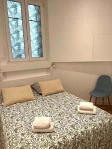 Llit o llits en una habitació de Appartement Rex