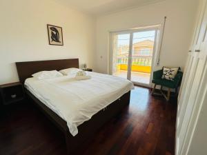 Ένα ή περισσότερα κρεβάτια σε δωμάτιο στο Bay Golf House