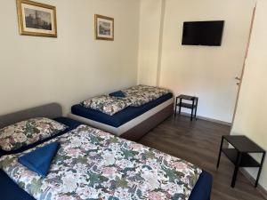 A bed or beds in a room at Četnická stanice Hluboká