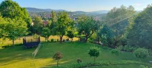 an aerial view of a park with a playground at Mieszkanko z tarasem in Limanowa
