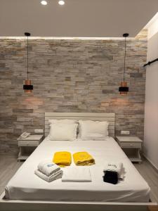Postel nebo postele na pokoji v ubytování Dimitra Hotel