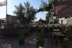 Zahrada ubytování LM Murati Hotel