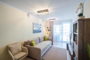TV a/nebo společenská místnost v ubytování Aquamarine Apartman