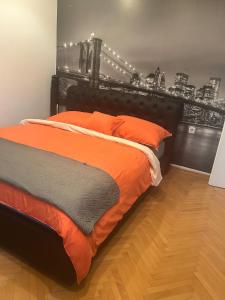 Postel nebo postele na pokoji v ubytování Wing apartman + 3 fotografie