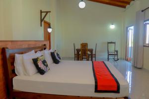 Postel nebo postele na pokoji v ubytování Athithi Villa + 37 fotografií