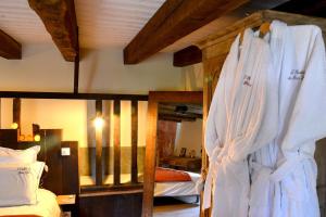 a bedroom with two bunk beds and a bed at Gite L étable du Bien Etre in Léré