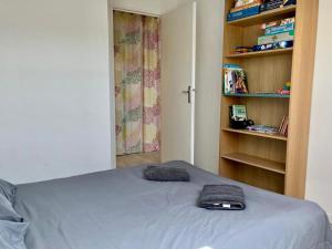 Posteľ alebo postele v izbe v ubytovaní Capucine, duplex à 5 min plage