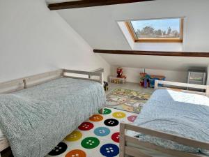 Posteľ alebo postele v izbe v ubytovaní Capucine, duplex à 5 min plage