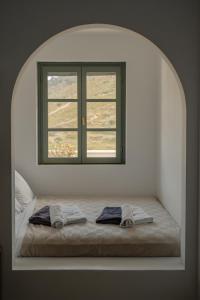 Ένα ή περισσότερα κρεβάτια σε δωμάτιο στο VERANNA Patmos D3 +19 φωτογραφίες