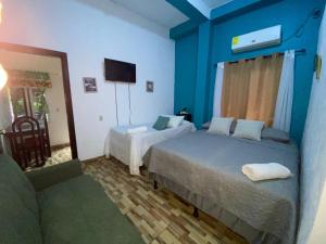 Postel nebo postele na pokoji v ubytování Casa Miramar Trux