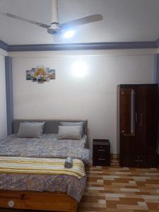 Postel nebo postele na pokoji v ubytování Nesting Abode Homestay