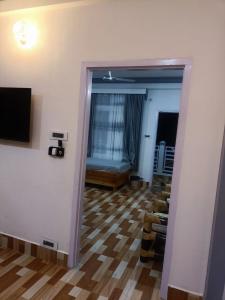 TV a/nebo společenská místnost v ubytování Nesting Abode Homestay