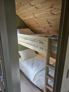 Voodi või voodid majutusasutuse Glamping with a View toas