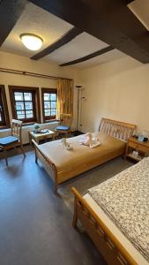 Postel nebo postele na pokoji v ubytování Hotel im Hochzeitshaus