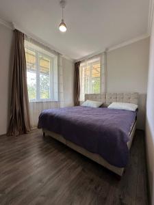 Voodi või voodid majutusasutuse Tazia Appartments toas