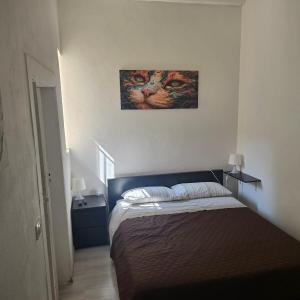 Ένα ή περισσότερα κρεβάτια σε δωμάτιο στο Casa del Carmine