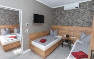 Postel nebo postele na pokoji v ubytování Second Home Hotel