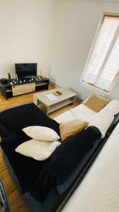 Posezení v ubytování Le terminus Appartement 2 chambres
