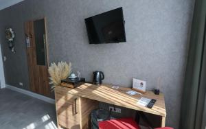 TV a/nebo společenská místnost v ubytování Second Home Hotel